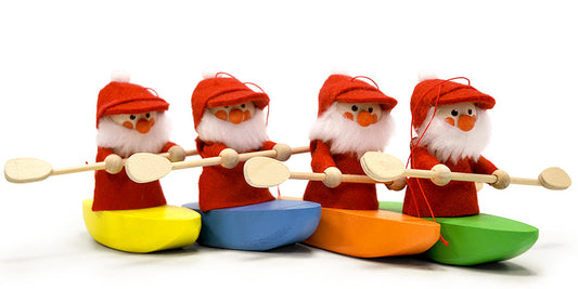 Boy Tomte in Green Canoe Ornament