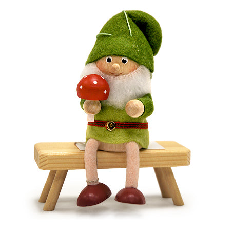 Nordic Man Sitting with a Mushroom Ornament
